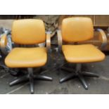 Two designer hairdresser's/barber's chairs