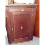 Georgian mahogany corner cupboard with shell inlay to door