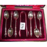 Cased set of silver apostle teaspoons with matching sugar tongs
