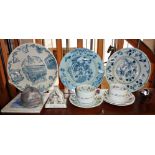 Two Delft plates (A/F), a Minton blue and white tile (A/F), a Fairing, two fortune telling cups