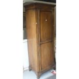 Bow fronted mahogany hall cupboard