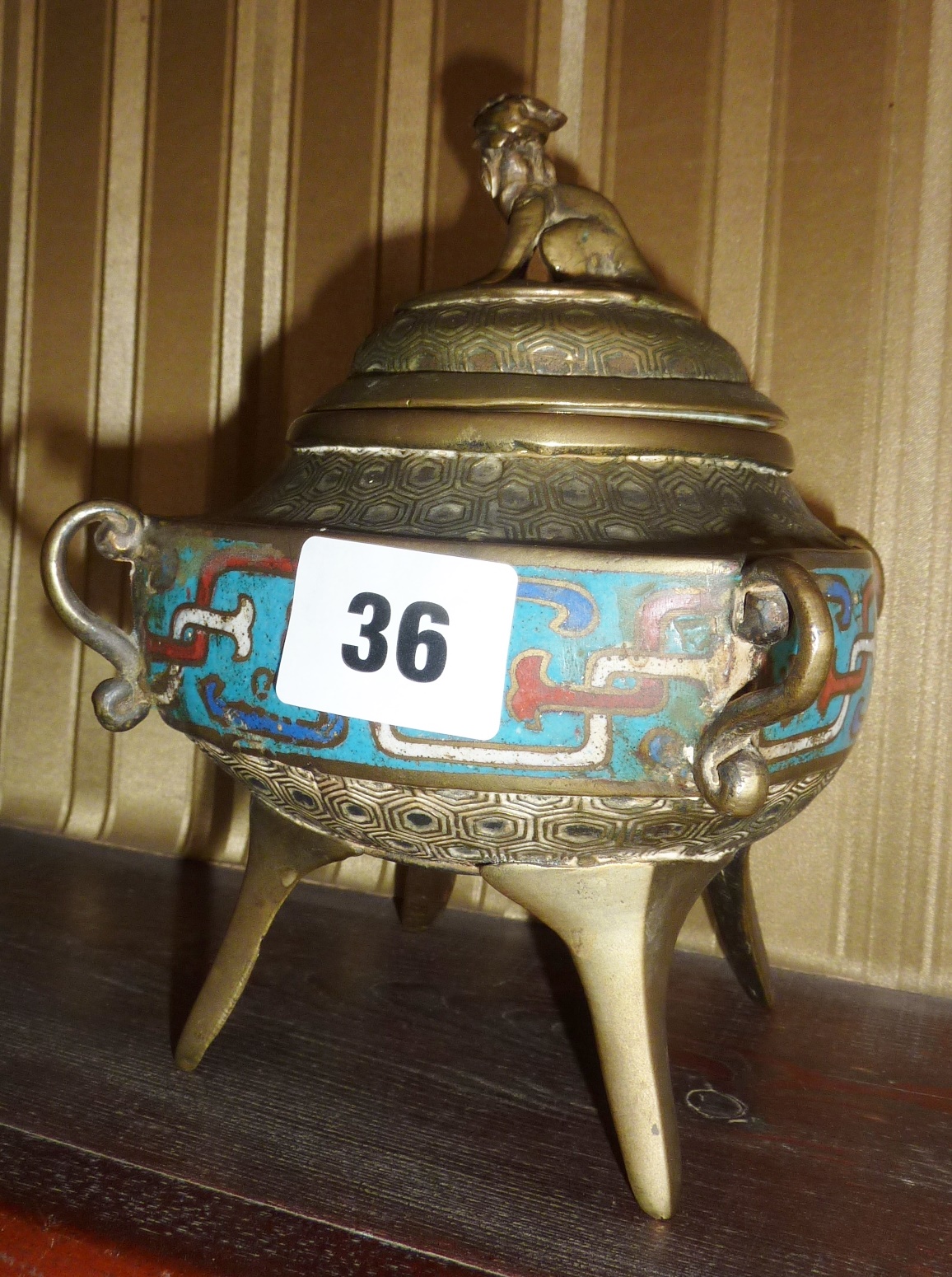 A Chinese bronze Qing period bronze and cloisonne censer with dog finial to lid, approx 15cm high