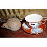 Japanese naturalistic porcelain teapot in the form of a quail, and a Kutani style cup and saucer,