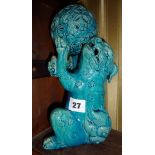Chinese stoneware turquoise glazed kylon with ball, approx 25cm high