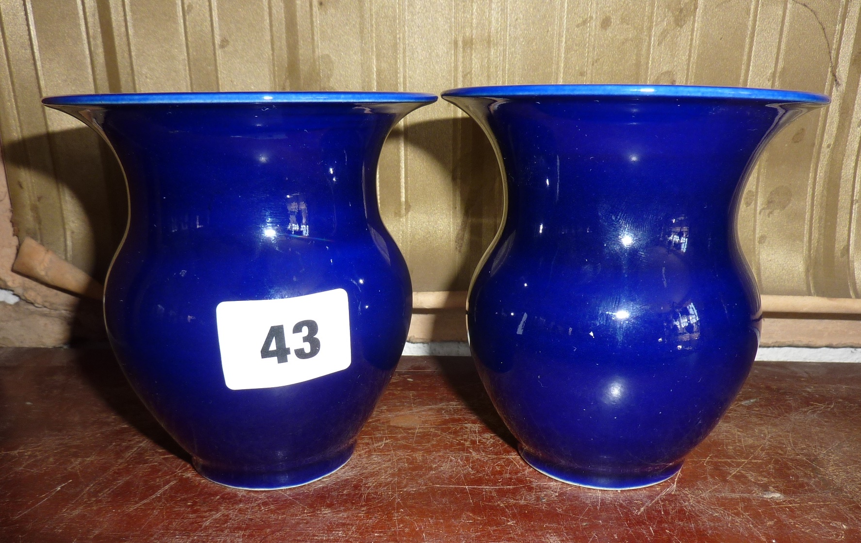 A pair of Chinese porcelain dark blue glazed squat vases with six character mark to bases, approx