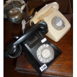 Telephones - black bakelite "TEL" desk telephone, and a 1960's cream telephone
