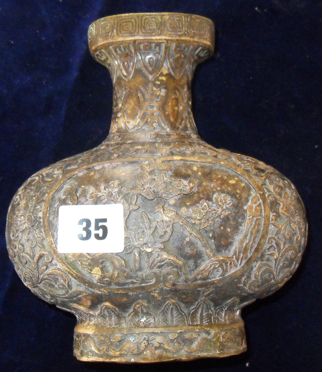 A Chinese bronze vase decorated with relief birds and flowers - stamped to base, approx 17cm high - Image 4 of 6