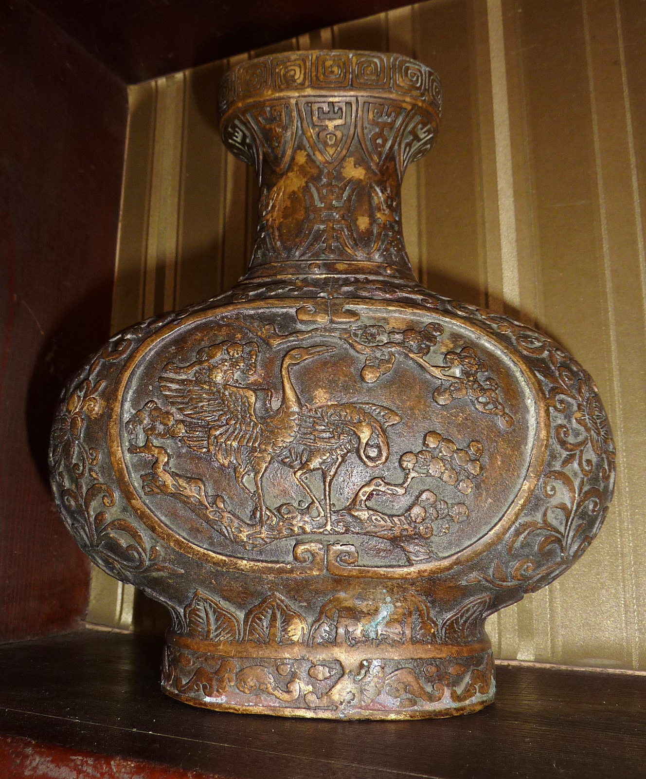 A Chinese bronze vase decorated with relief birds and flowers - stamped to base, approx 17cm high - Image 2 of 6