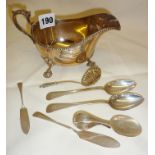 Hallmarked silver items, sauce boat, spoons and butter spreaders, approx 9.3 troy oz