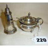 Hallmarked silver mustard pot and spoon with a blue glass liner, and a silver pepper pot