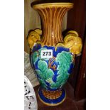 Majolica vase decorated with ram's heads and grapevines