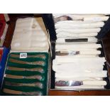 Cased set of silver handled cake knives and a cased set of fish knives and forks