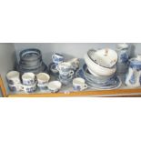 Large quantity of willow pattern dinner & teaware