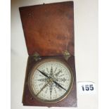 Old compass in wooden case