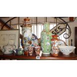 Shelf of miscellaneous Chinese and Japanese porcelain, inc. vases, plates, teapots etc.