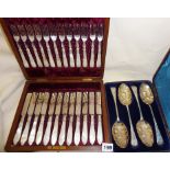 Set of four silver plated berry spoons in case, and a 24 piece boxed set of engraved silver plated