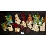 Collection of oriental figures (11), and three porcelain Foo dog figures