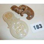 A Chinese Hetian Jade 'two dragon' pendant and a Tibetan hardstone rabbit amulet