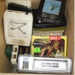 Collection of 8-track stereo tapes with a Harry Moss Super 8 player, and a quantity of 8mm vintage