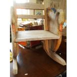 Painted & carved hardwood child's rocking chair with carved swan uprights