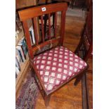 Pair of 19th c. mahogany dining chairs with top rail above stick splats and upholstered drop in