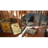 Four Victorian and later brass framed trifold vanity mirrors with decorated backs
