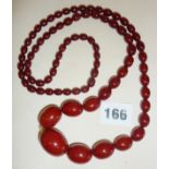 Cherry amber bakelite beaded necklace, approx, 17" long, approx. 62g