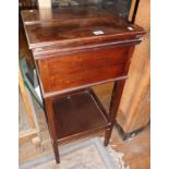Mahogany sewing table with fold-out top and fitted interior