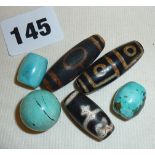 Three antique Tibetan agate Dzi beads and three natural turquoise Dzi beads