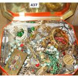 Tin containing vintage costume jewellery