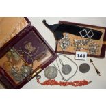 Assorted silver coins and jewellery in a leather box, inc. silver earrings, Persian silver coin