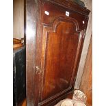 18th c. oak corner cupboard, arched top fielded panel door and "H" brass hinges, good patina
