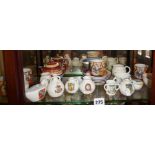 Shelf of crested china, mostly W.H. Goss