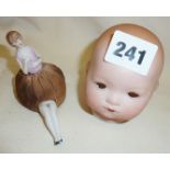 Armand Marseille finely painted baby doll's head, and a 1920's pincushion doll