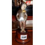 Art Deco silvered bronze figure of a Dutch boy with carved bone face and standing on turned wood