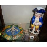 Italian Maiolica baby wall plaque (A/F), and a Staffordshire Toby Jug