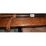 Old ebony police truncheon with leather strap