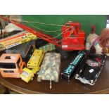 Triang toy crane, battery operated dog, a Durango Mercedes and other toy vehicles etc.