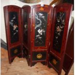 Four fold Japanese lacquer firescreen with mother of pearl decorated panels