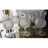 Set of six Edinburgh crystal thistle wine glasses, faceted with etched decoration (one chipped)