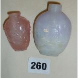 Chinese carved hardstone snuff bottles, lavender jade, and rose quartz