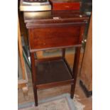 Mahogany sewing table with fold-out top and fitted interior