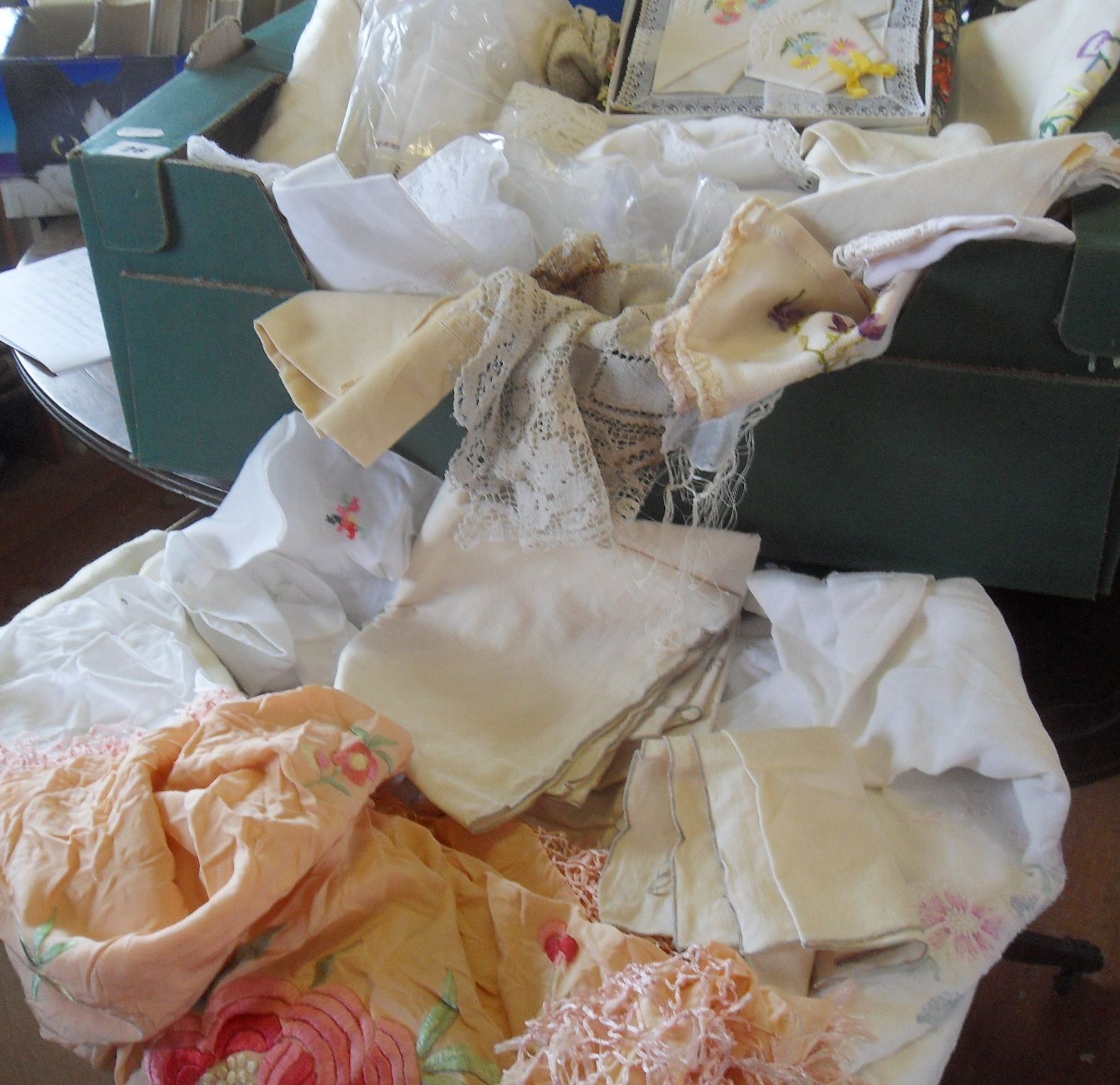 Two large boxes of assorted textiles and table linen