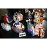 Six various Royal Crown Derby bird figurines and a Beswick Old Mrs Brown figure
