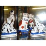 Pair of small 20th c. Staffs Dalmatian dogs, pair of cats and another dog