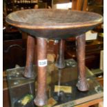 Tribal Art: Antique African four legged stool, possibly South West Kenya, with dished top