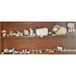Large collection of assorted sheep ornaments and two industrial wooden wool winding spindles