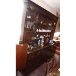 Georgian style cross-banded oak Farmhouse dresser with shaped frieze, the rack with two spice