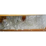 Large quantity of cut glass drinking glasses and decanters