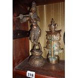 Old Indian bronze figure of a woman playing a flute and another similar